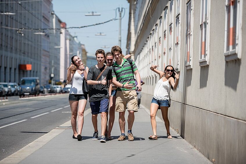 Group of students walking in the streets.